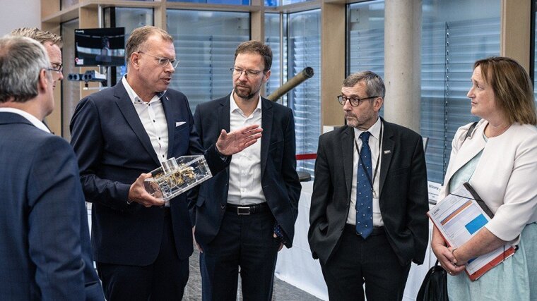 Prof. Dr. Tünnermann, Dr. Nitzsche, Prof. Dr. Rosenthal and Prof. Schieferdecker at the anniversary celebration.
