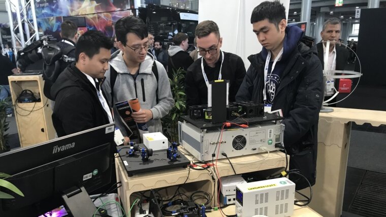 Dr. Dimitris Gkiatas showing quantum experiments at  the Hannover Messe 2024.