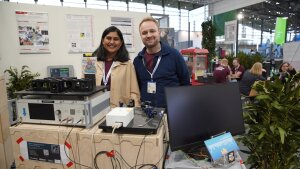 ACP staff Monika and David Zakoth showing quantum experiments at  the Hannover Messe 2024.